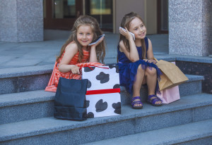 Kids girls ladies amid the shopping centre in the city